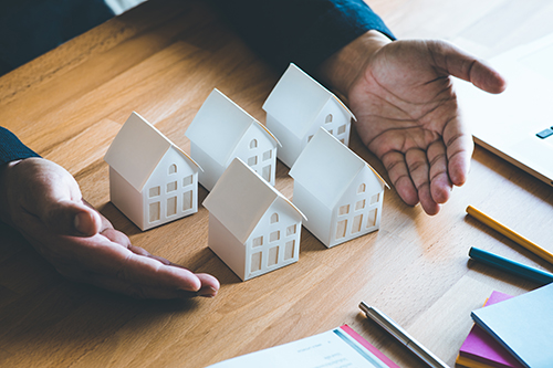 If you can’t solo invest in real estate, you may be considering a real estate partnership. Consider the pros and cons in this post before you start.